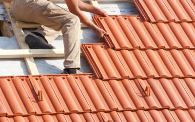 Comment un couvreur à Genève adapte-t-il une toiture lorsqu’un propriétaire souhaite installer un conduit de cheminée supplémentaire ?